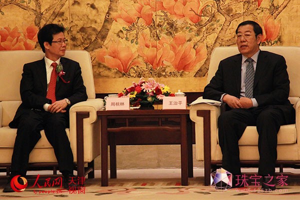 天津市政協副主席王治平會見百泰集團創始人周桃林。